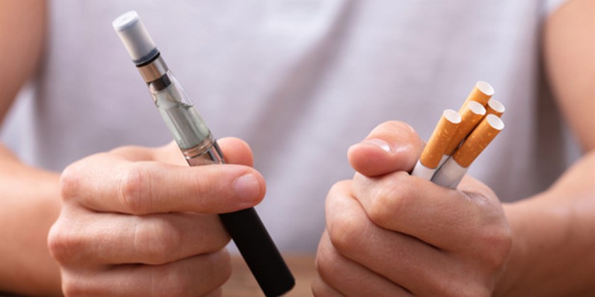 British research reiterated e-cigarettes are not harmless, but safer than traditional cigarettes